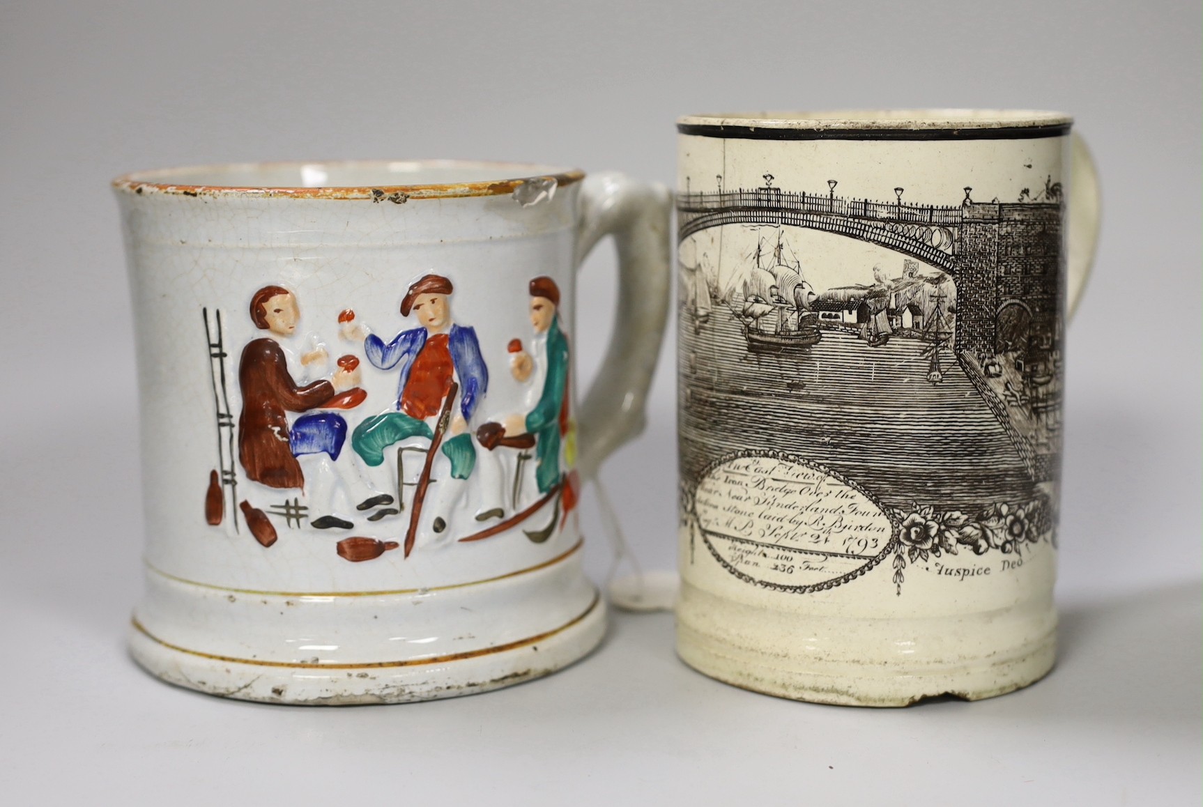 A Sunderland Bridge commemorative creamware ‘frog’ mug, c.1800, 13.5 cm high and a Staffordshire relief moulded mug